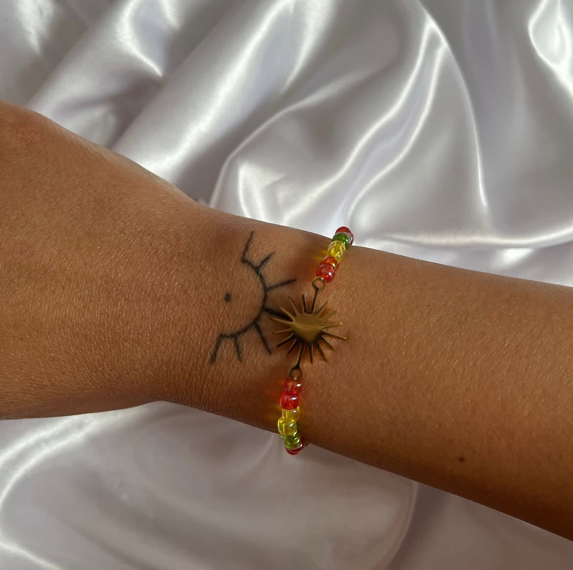 Sonnenarmband aus Saatperlen